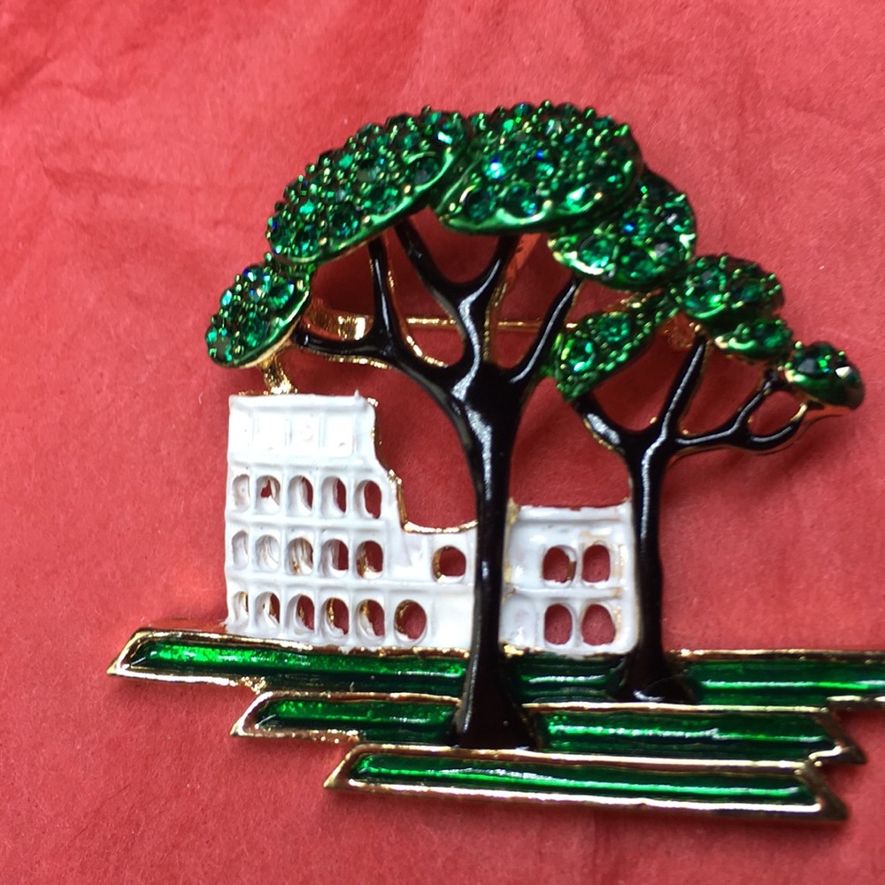 Jeweled brooch of trees building